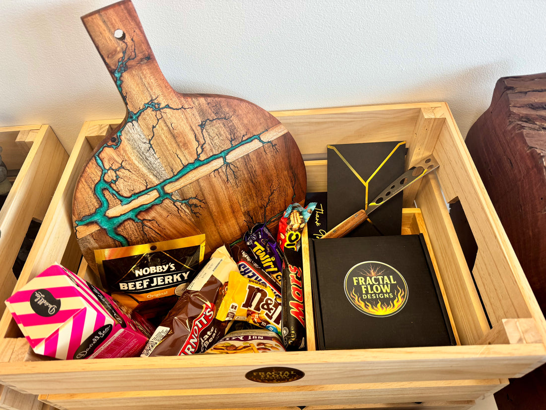 Premium Australian resin board gift hamper with cheese knife, care kit, snacks, and timber box – handmade by Fractal Flow Designs