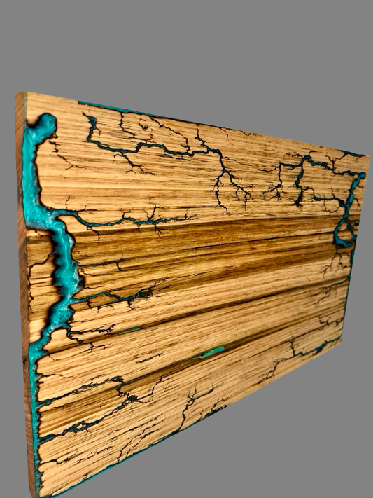 One-of-a-kind teal resin serving board handcrafted in Bairnsdale by Fractal Flow Designs. Custom orders welcome. Fractal Flow Designs resin timber board– handcrafted in Bairnsdale, Victoria using Australian hardwood. Functional art for BBQ lovers , hallways, and gift lovers across Australia.