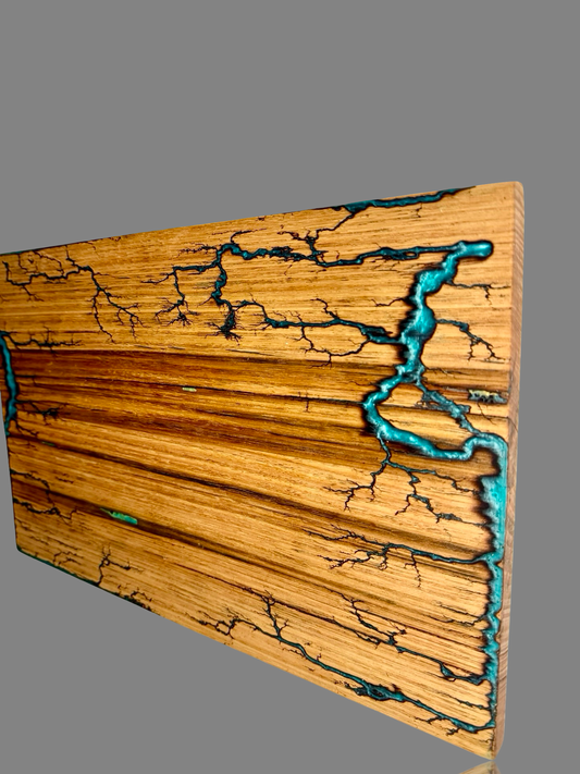 Limited edition timber platter with teal resin inlay and fractal burning art by fractal flow designs Australian timber and resin boards company located in east Gippsland town of Bairnsdale 