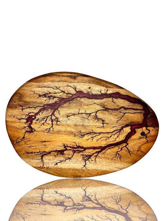 Pebble form resin grazing board handcrafted from acacia wood with fractal burning design by Fractal Flow Designs, made in Bairnsdale, Victoria, Australia