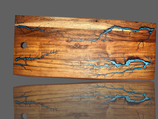Luxury live edge serving board – epoxy river design with natural timber grain and bold artisan detailing