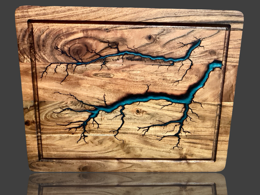 Australian-made resin and electric burnt acacia chopping board – handcrafted timber kitchen board with turquoise epoxy inlay, created by Fractal Flow Designs in Bairnsdale, Victoria, perfect for charcuterie, serving, and gifting, ships Australia-wide.