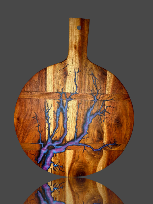 Round timber paddle board by Fractal Flow Designs – handcrafted in Bairnsdale, Victoria using Australian hardwood. Available at our Bairnsdale gift shop, ideal for cheese platters, BBQ grazing, and Australian-made gifts