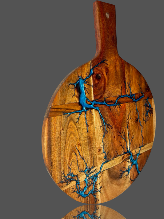 Round timber cheese board paddle by Fractal Flow Designs – handcrafted in Bairnsdale and stocked in our local gift shop. A go-to for grazing lovers across Australia