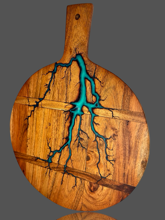 Resin-accented round paddle board by Fractal Flow Designs – crafted in Bairnsdale with Australian wood. A premium gift item for foodies, hosts, and BBQ events