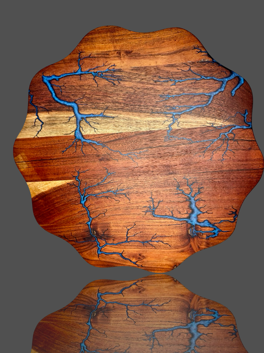 Wave resin serving board by Fractal Flow Designs – handcrafted in Bairnsdale, Victoria with Australian timber and ocean-inspired epoxy art. Ideal for cheese, grazing, BBQs, available in our gift shop and we offer shipping Australia-wide